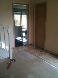 Downstairs hallway before tiling